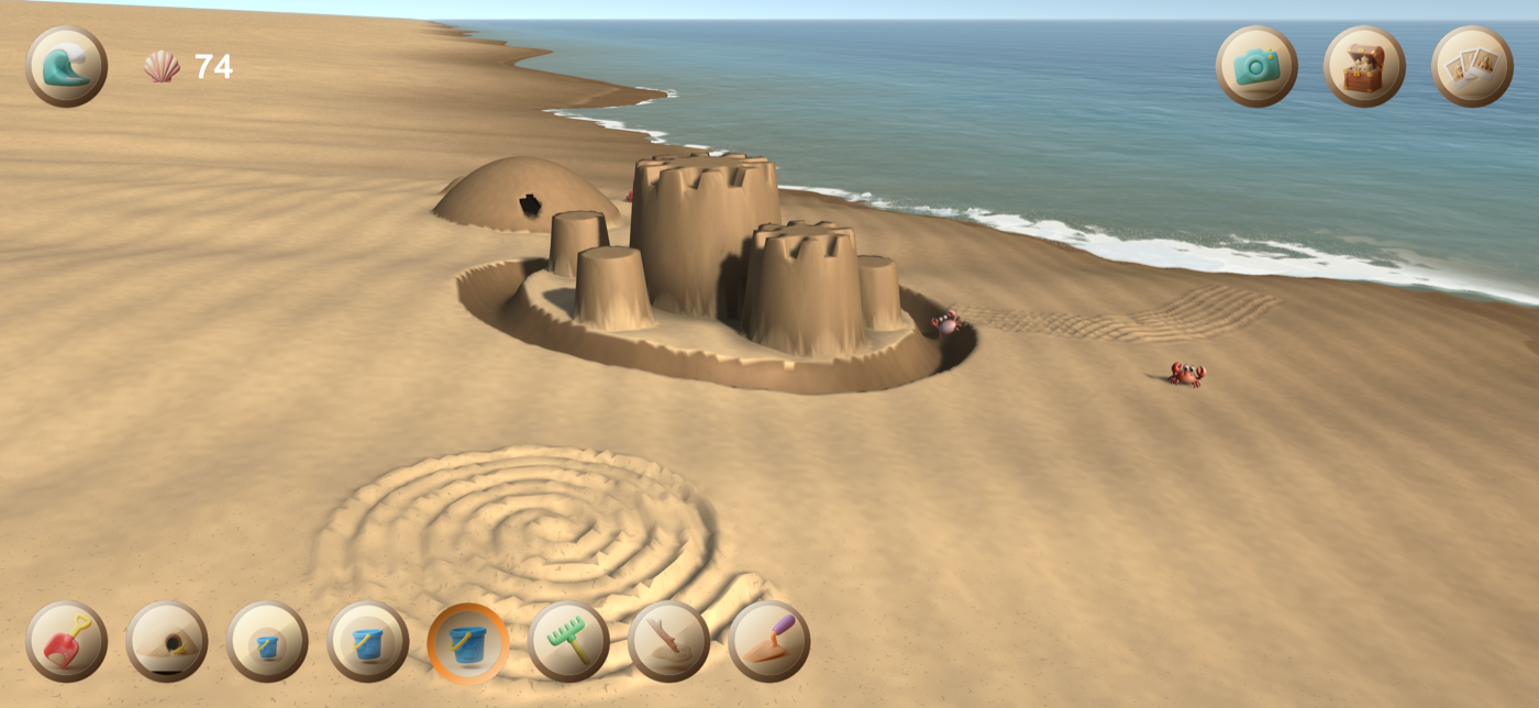 Un château de sable en construction sur la plage