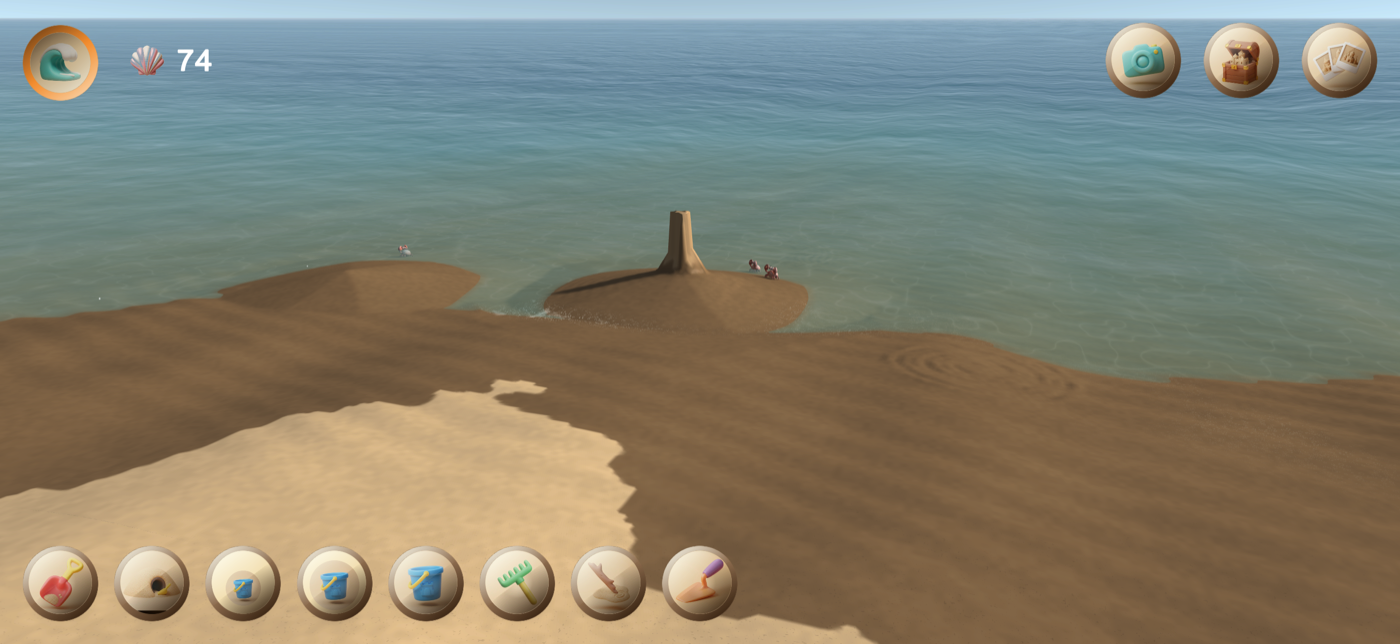 La mer monte autour du château de sable